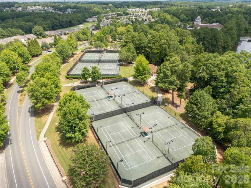 1079 Falling Leaf Street, Indian Land, SC 29707.  MLS# CAR4313558, YatesRealty ID 28772. Tennis..bocce..pickleball..and more!