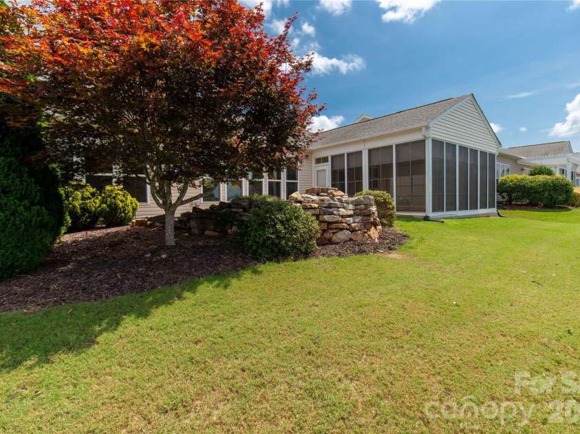 1079 Falling Leaf Street, Indian Land, SC 29707.  MLS# CAR4313558, YatesRealty ID 28772. View from backyard into sunroom