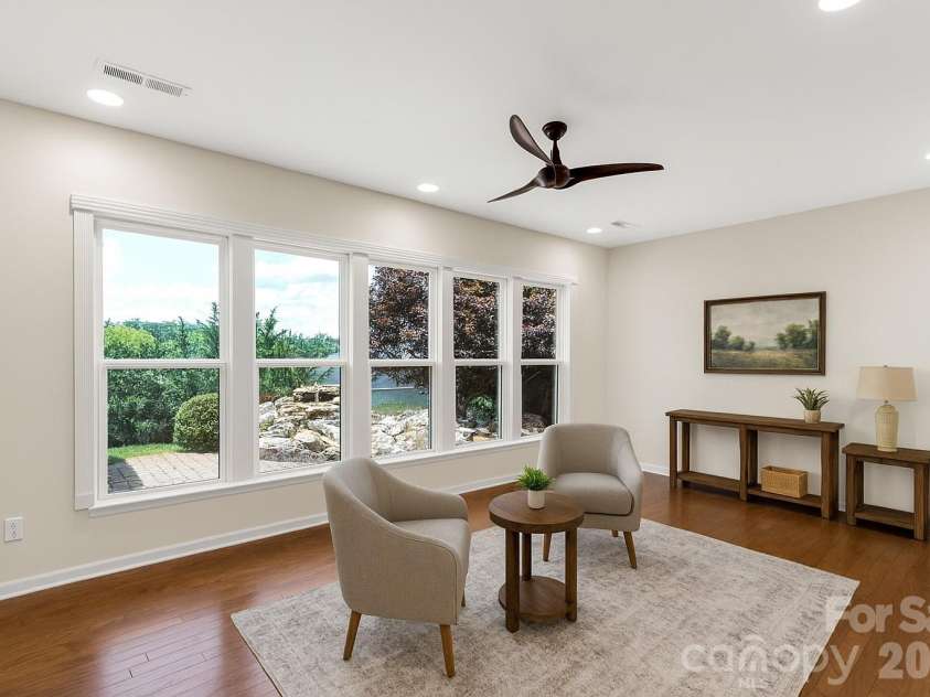 1079 Falling Leaf Street, Indian Land, SC 29707.  MLS# CAR4313558, YatesRealty ID 28772. Virtually staged sunroom