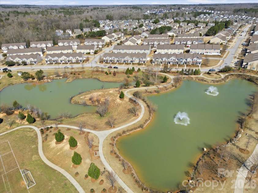 1037 Pennington Drive, Lancaster, SC 29720.  MLS# CAR4356088, YatesRealty ID 28777. Walnut Creek Pond from Walking Trail