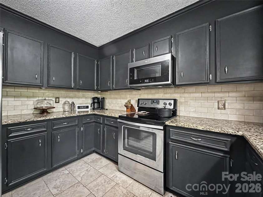 213 Bostian Lake Road, Statesville, NC 28677.  MLS# CAR4390171, YatesRealty ID 28780. 