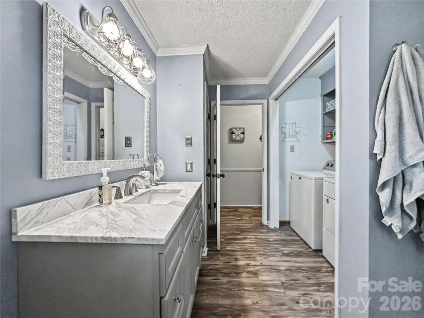 213 Bostian Lake Road, Statesville, NC 28677.  MLS# CAR4390171, YatesRealty ID 28780. 