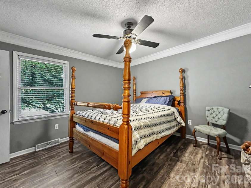 213 Bostian Lake Road, Statesville, NC 28677.  MLS# CAR4390171, YatesRealty ID 28780. 