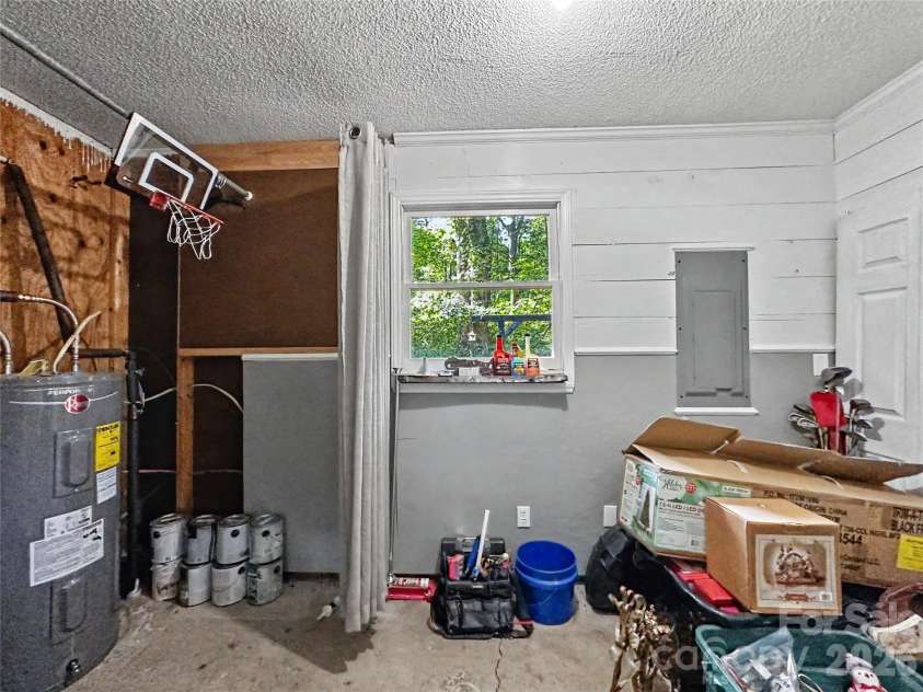 213 Bostian Lake Road, Statesville, NC 28677.  MLS# CAR4390171, YatesRealty ID 28780. 