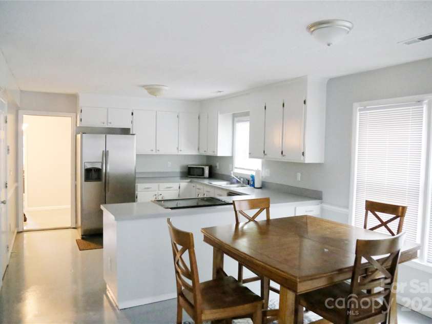 9900 Alexander Glen Drive, Charlotte, NC 28262.  MLS# CAR4285892, YatesRealty ID 28788. 9900 AGDr - Kitchen/Dining