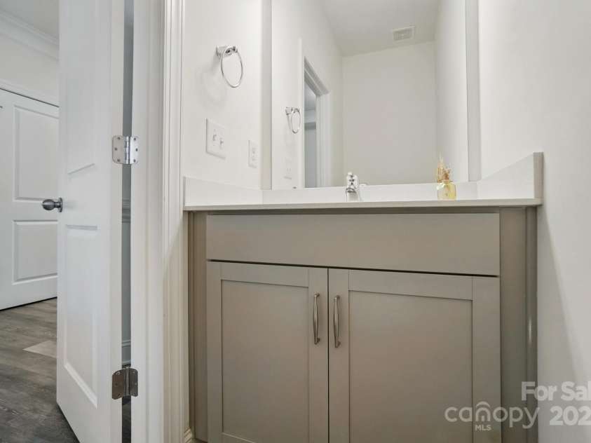 8018 Saluda Drive, Charlotte, NC 28269.  MLS# CAR4255269, YatesRealty ID 28789. Convienently located powder room.