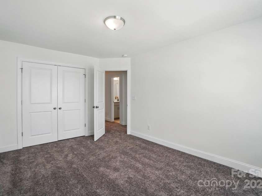 8018 Saluda Drive, Charlotte, NC 28269.  MLS# CAR4255269, YatesRealty ID 28789. Fresh carpet and natural light make this a comfortable third bedroom