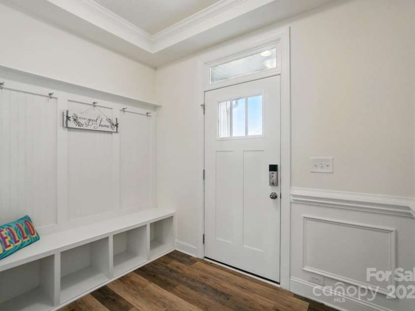 8018 Saluda Drive, Charlotte, NC 28269.  MLS# CAR4255269, YatesRealty ID 28789. Step inside to a welcoming drop zone—perfect for keys, bags, and staying organized.