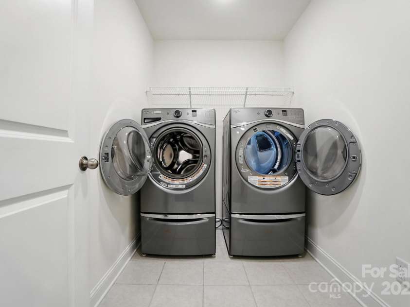 8018 Saluda Drive, Charlotte, NC 28269.  MLS# CAR4255269, YatesRealty ID 28789. Upstairs laundry—washer and dryer included for move-in ease!