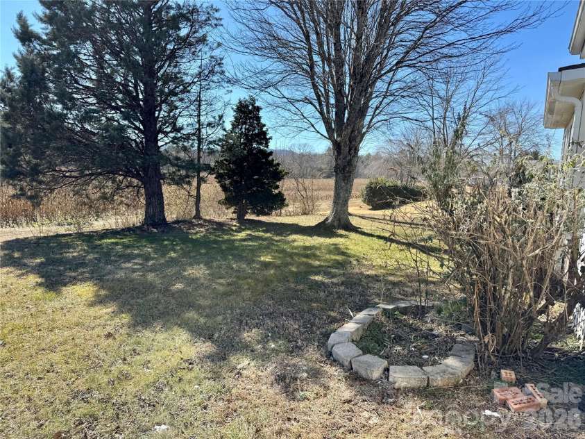 436 Riverwind Drive, Hendersonville, NC 28739.  MLS# CAR4219955, YatesRealty ID 2879. Back yard