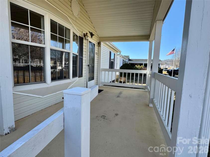 436 Riverwind Drive, Hendersonville, NC 28739.  MLS# CAR4219955, YatesRealty ID 2879. Covered front porch
