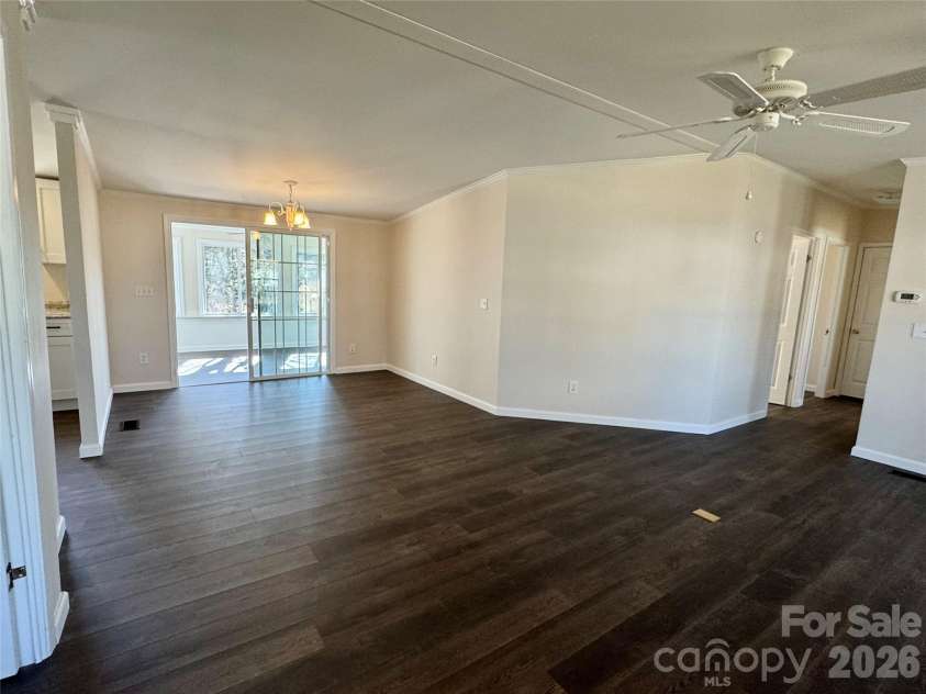 436 Riverwind Drive, Hendersonville, NC 28739.  MLS# CAR4219955, YatesRealty ID 2879. Dining area opens to sunroom