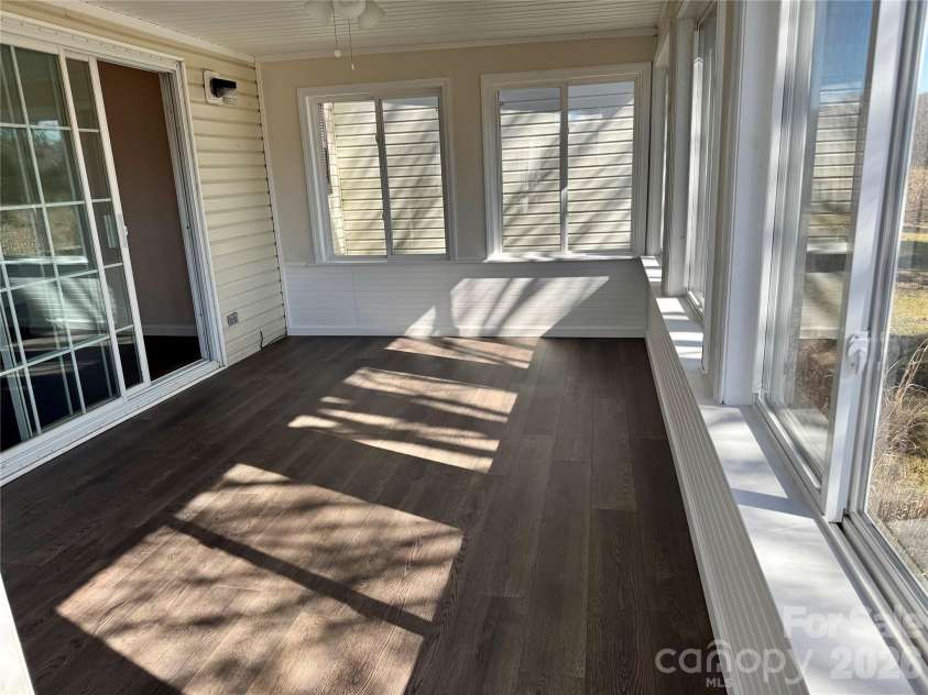 436 Riverwind Drive, Hendersonville, NC 28739.  MLS# CAR4219955, YatesRealty ID 2879. Sunroom