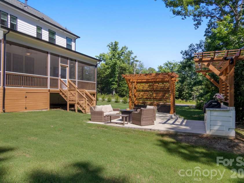 228 Herd Path Court, Clover, SC 29710.  MLS# CAR4387418, YatesRealty ID 28790. Grilling station/Extended patio/Screened in backporch view