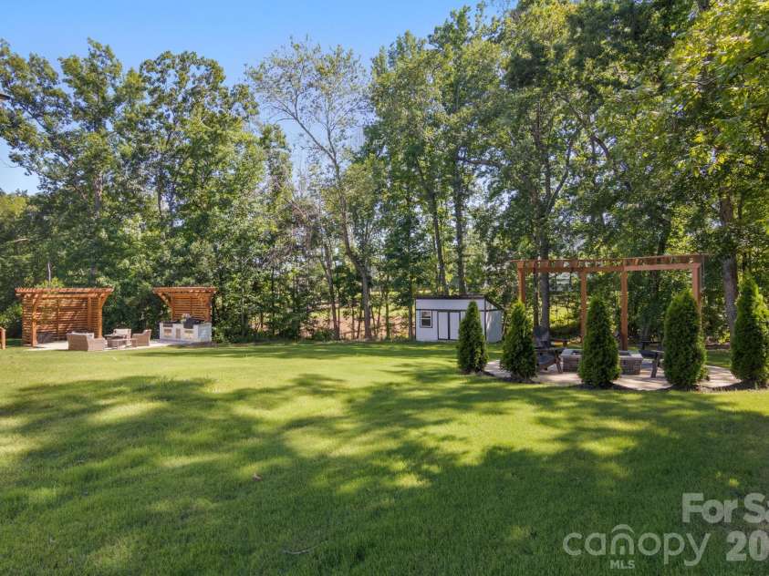 228 Herd Path Court, Clover, SC 29710.  MLS# CAR4387418, YatesRealty ID 28790. Side yard