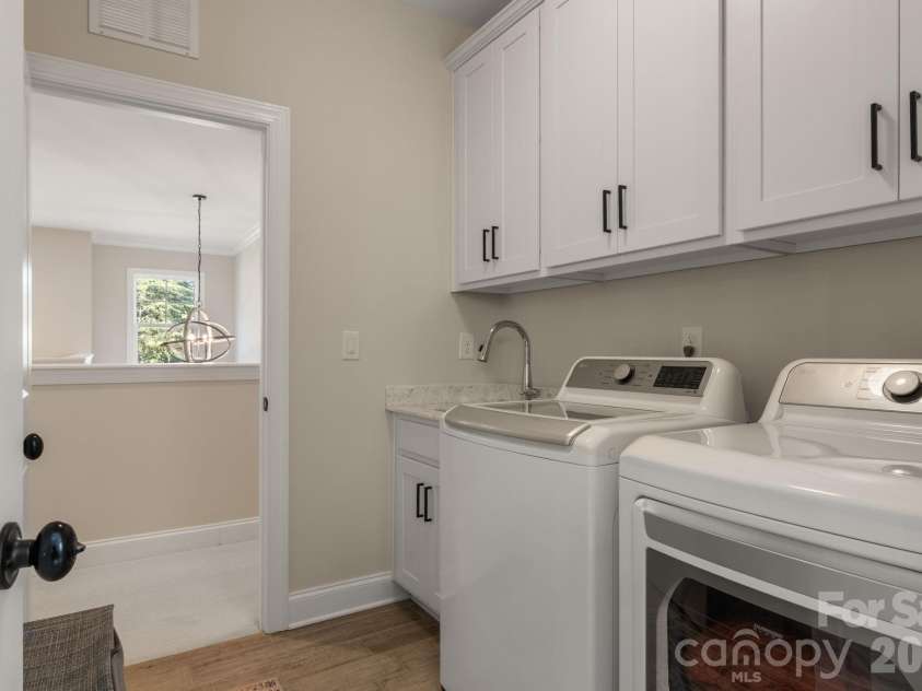 228 Herd Path Court, Clover, SC 29710.  MLS# CAR4387418, YatesRealty ID 28790. Upstairs laundry room