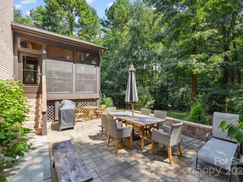 4550 Osprey Run Court, Denver, NC 28037.  MLS# CAR4278336, YatesRealty ID 28795. Brick Paver Patio with Stone Retaining Wall