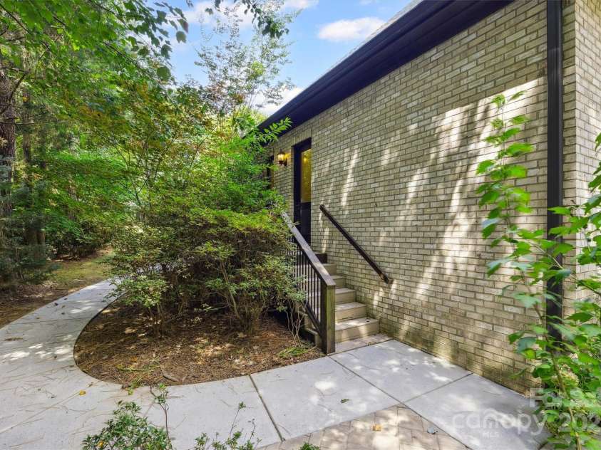 4550 Osprey Run Court, Denver, NC 28037.  MLS# CAR4278336, YatesRealty ID 28795. Concrete Walkway From Driveway to Private Full Bath Entrace and Paver Patio