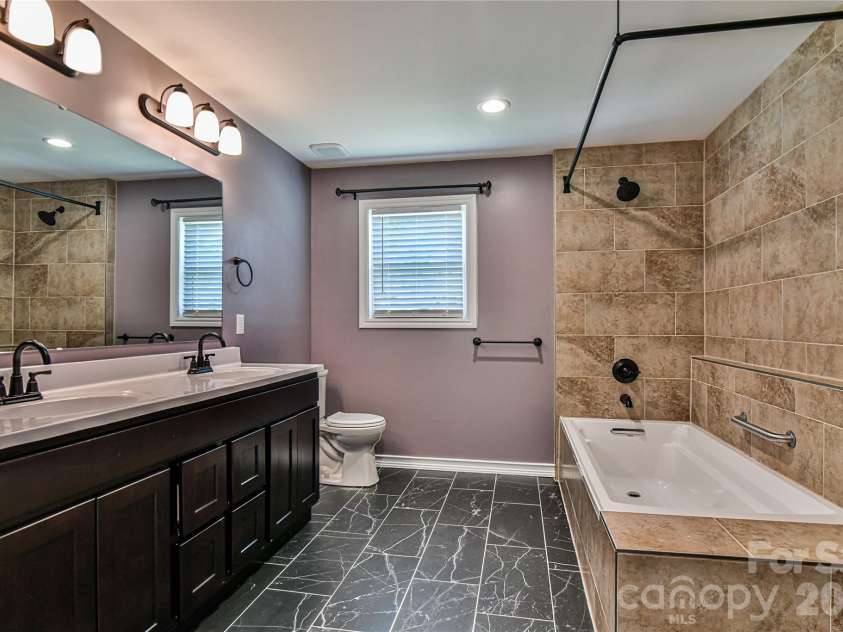 115 Wicklow Drive, Asheville, NC 28806.  MLS# CAR4389269, YatesRealty ID 28797. En suite primary bath.