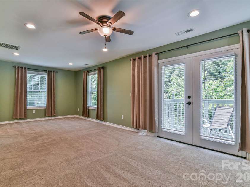 115 Wicklow Drive, Asheville, NC 28806.  MLS# CAR4389269, YatesRealty ID 28797. Upper level primary suite.