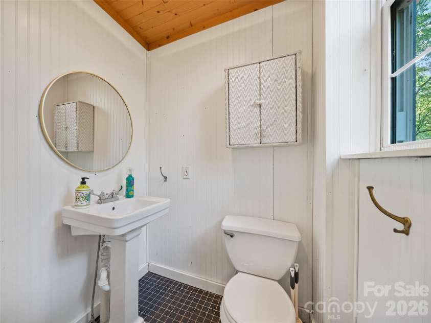 1896 State Hwy 80 S None, Burnsville, NC 28714.  MLS# CAR4389754, YatesRealty ID 28798. Main Level Half Bath
