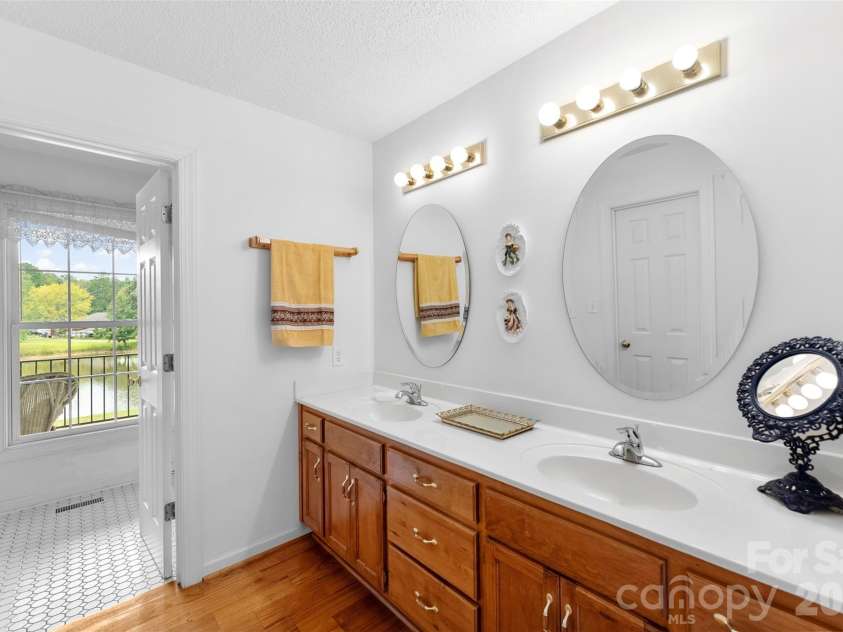908 Ramseur Road, Bessemer City, NC 28016.  MLS# CAR4299106, YatesRealty ID 288. Primary bath