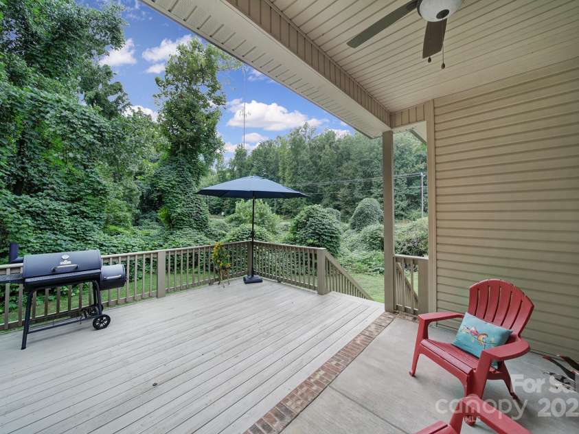 910 Pine Knoll Road, Fort Mill, SC 29715.  MLS# CAR4287657, YatesRealty ID 2880. Back covered patio and deck