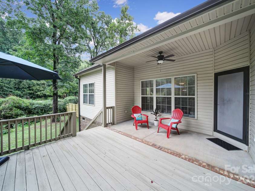 910 Pine Knoll Road, Fort Mill, SC 29715.  MLS# CAR4287657, YatesRealty ID 2880. Back covered patio and deck