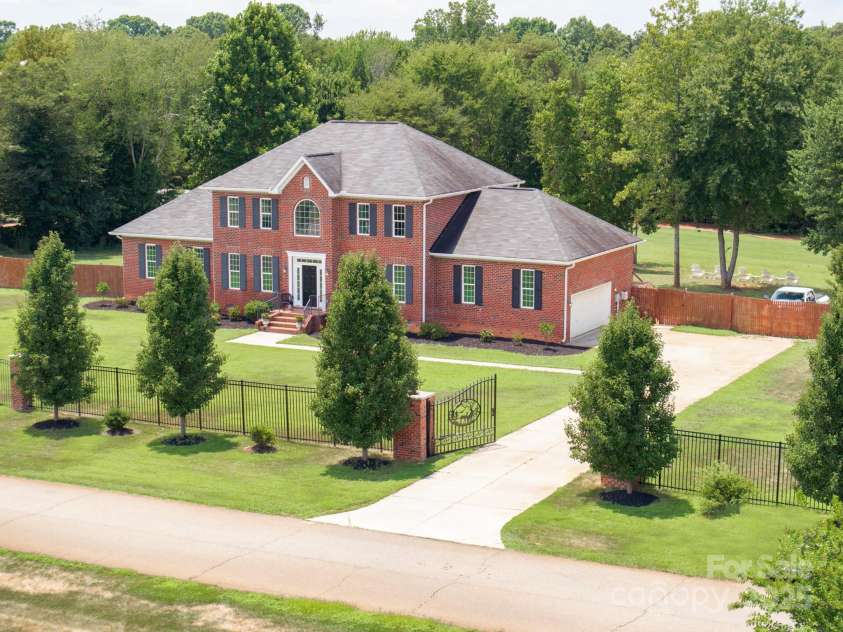 168 Harwell Road, Mooresville, NC 28117.  MLS# CAR4282323, YatesRealty ID 28807. 2.11 Acres of gated estate
