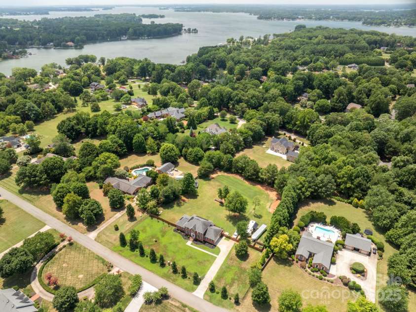 168 Harwell Road, Mooresville, NC 28117.  MLS# CAR4282323, YatesRealty ID 28807. Aerial shot of property and Lake Norman