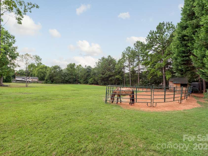 168 Harwell Road, Mooresville, NC 28117.  MLS# CAR4282323, YatesRealty ID 28807. Horse Paddock on gated estate with Lake Norman access
