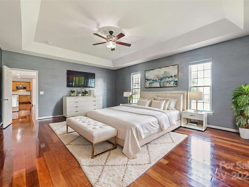 168 Harwell Road, Mooresville, NC 28117.  MLS# CAR4282323, YatesRealty ID 28807. Primary Bedroom with Ensuite off Living Room virtually staged