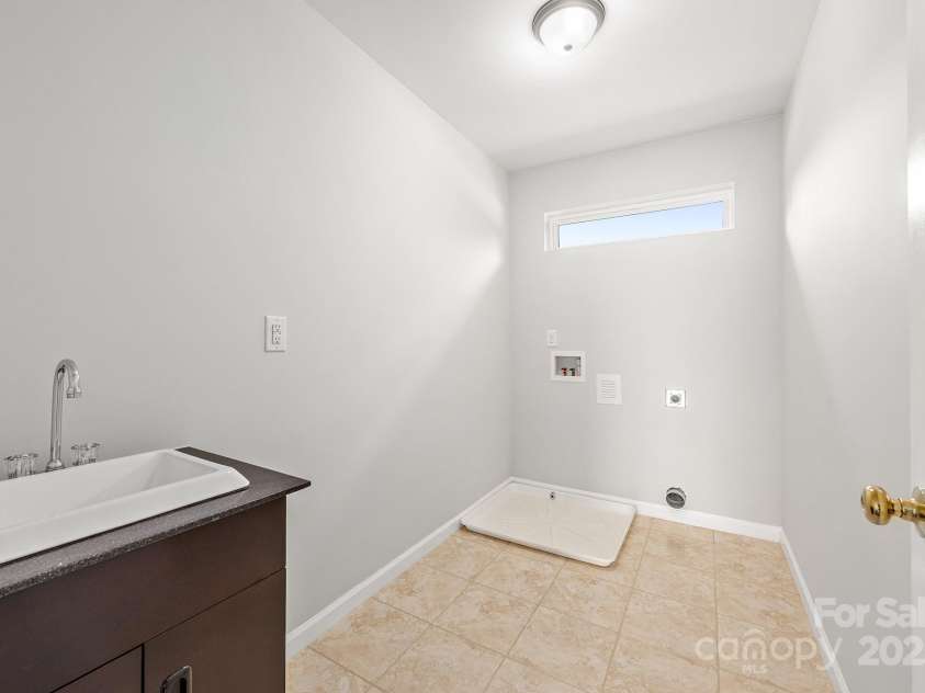168 Harwell Road, Mooresville, NC 28117.  MLS# CAR4282323, YatesRealty ID 28807. Utility Room Upstairs