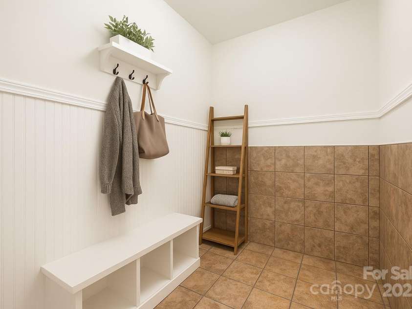 168 Harwell Road, Mooresville, NC 28117.  MLS# CAR4282323, YatesRealty ID 28807. Virtually staged dropzone or possible  main level utility room