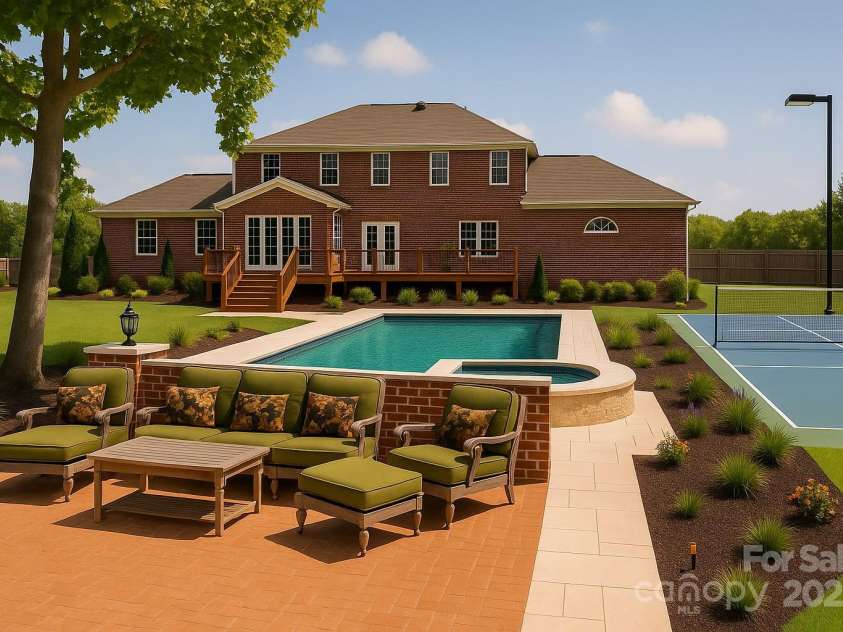 168 Harwell Road, Mooresville, NC 28117.  MLS# CAR4282323, YatesRealty ID 28807. Virtually staged pool and pickleball court in backyard