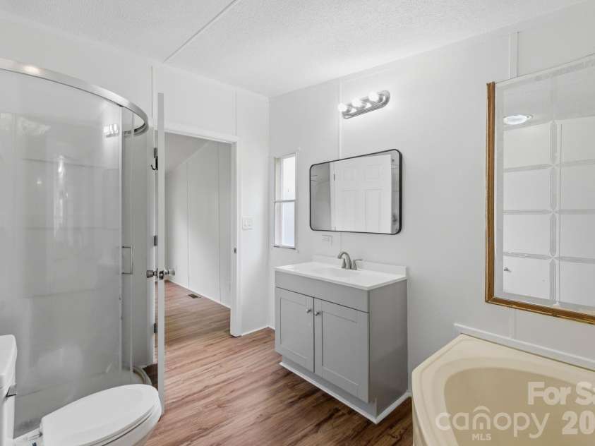 1509 Leonards Fork Church Road, Lincolnton, NC 28092.  MLS# CAR4381605, YatesRealty ID 28809. Primary bathroom