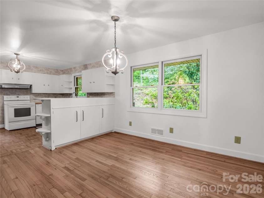 200 Little Wings Mountain Road, Columbus, NC 28722.  MLS# CAR4289310, YatesRealty ID 2881. Dining area open to kitchen