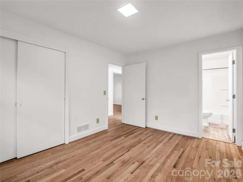 200 Little Wings Mountain Road, Columbus, NC 28722.  MLS# CAR4289310, YatesRealty ID 2881. Primary Bedroom with large closet and en-suite bath