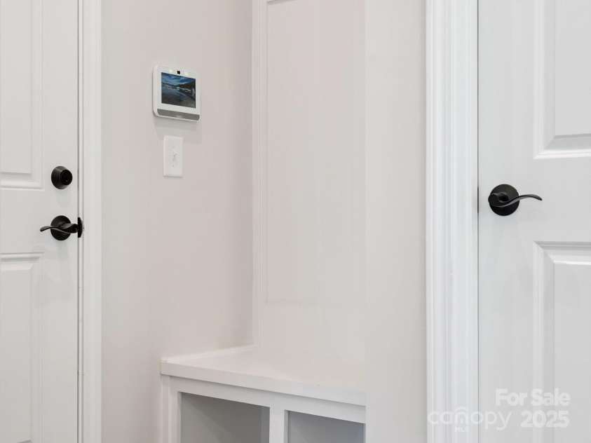 619 Webster Lane, Cramerton, NC 28032.  MLS# CAR4322006, YatesRealty ID 2881. Built-In Drop Zone Creating Convenience at Garage Entry.  *Model Photos | Actual Finishes, Structural Selections, and Orientation May Vary.