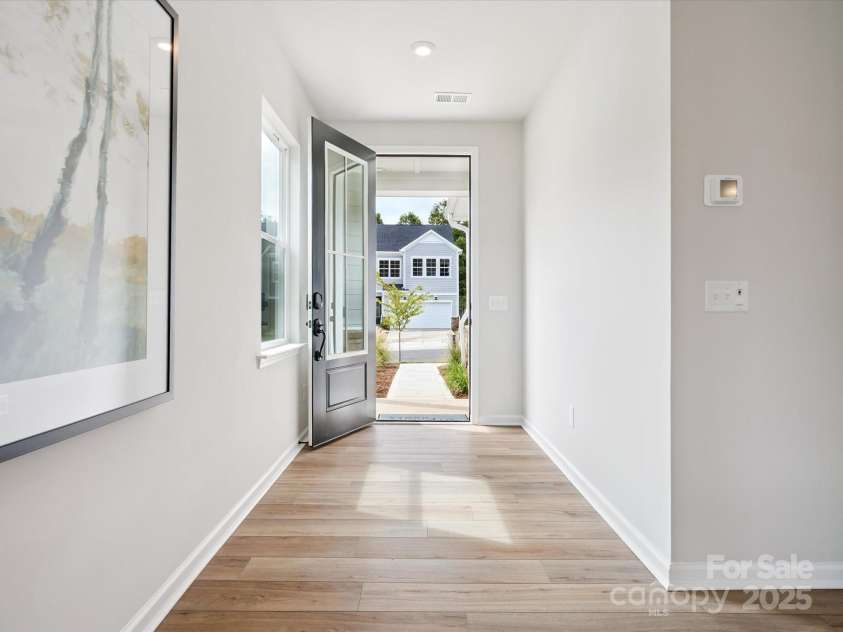 619 Webster Lane, Cramerton, NC 28032.  MLS# CAR4322006, YatesRealty ID 2881. Front Entry and Foyer Through 8' Doorway.  *Model Photos | Actual Finishes, Structural Selections, and Orientation May Vary.