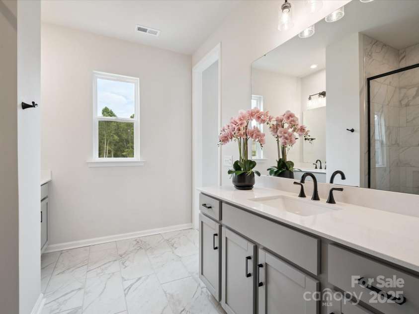 619 Webster Lane, Cramerton, NC 28032.  MLS# CAR4322006, YatesRealty ID 2881. Split Dual Vanity at Primary En Suite Bath.  *Model Photos | Actual Finishes, Structural Selections, and Orientation May Vary.