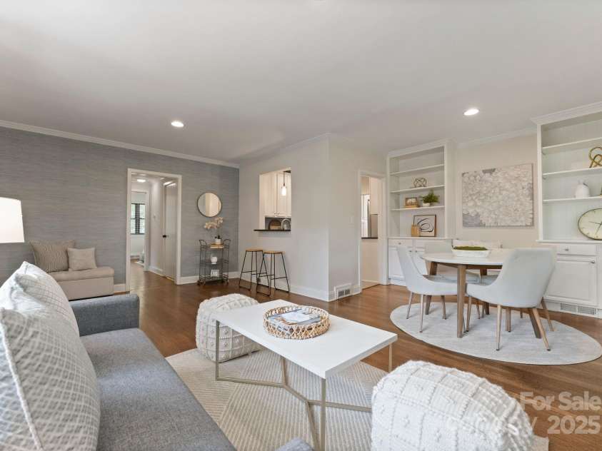 1120 Guilford Road, Charlotte, NC 28209.  MLS# CAR4284031, YatesRealty ID 28816. Living Room and Dining Area