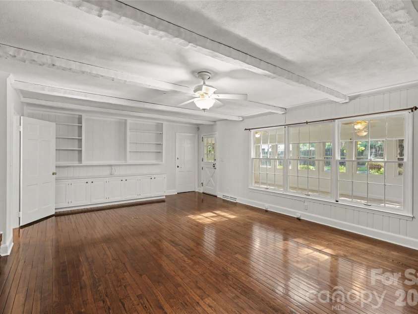 930 Scotch Drive, Gastonia, NC 28054.  MLS# CAR4385001, YatesRealty ID 28831. Warm gathering space with custom built-ins