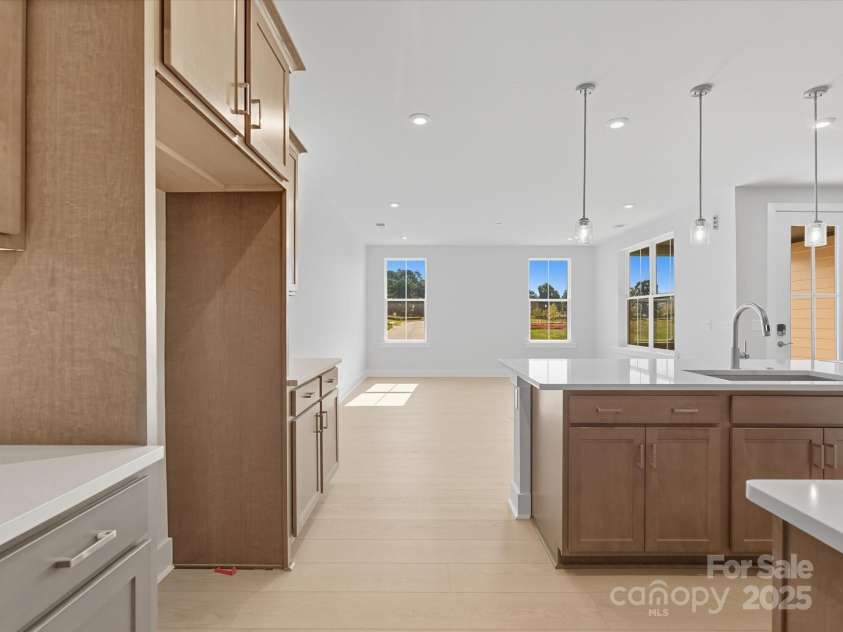 323 Ardmore Drive, Belmont, NC 28012.  MLS# CAR4319122, YatesRealty ID 28845. Bright and Light, These Connected Living Spaces Ensure You Never Miss a Moment.