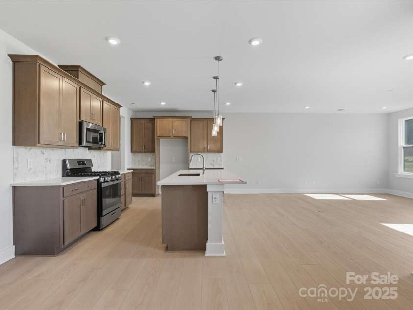 323 Ardmore Drive, Belmont, NC 28012.  MLS# CAR4319122, YatesRealty ID 28845. Designer Pendant Lighting Adds Interest to the Space.