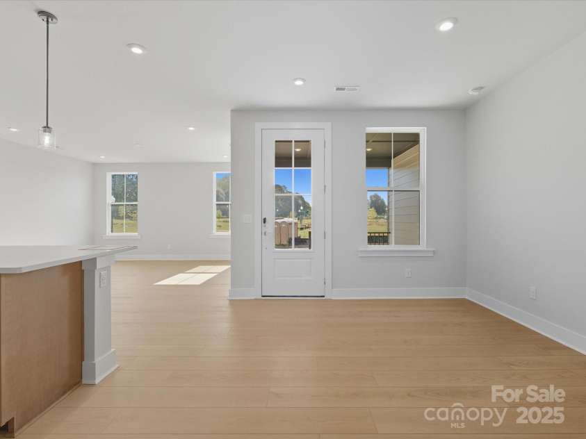 323 Ardmore Drive, Belmont, NC 28012.  MLS# CAR4319122, YatesRealty ID 28845. Front Entry Through 8' Glass Paned Doorway.