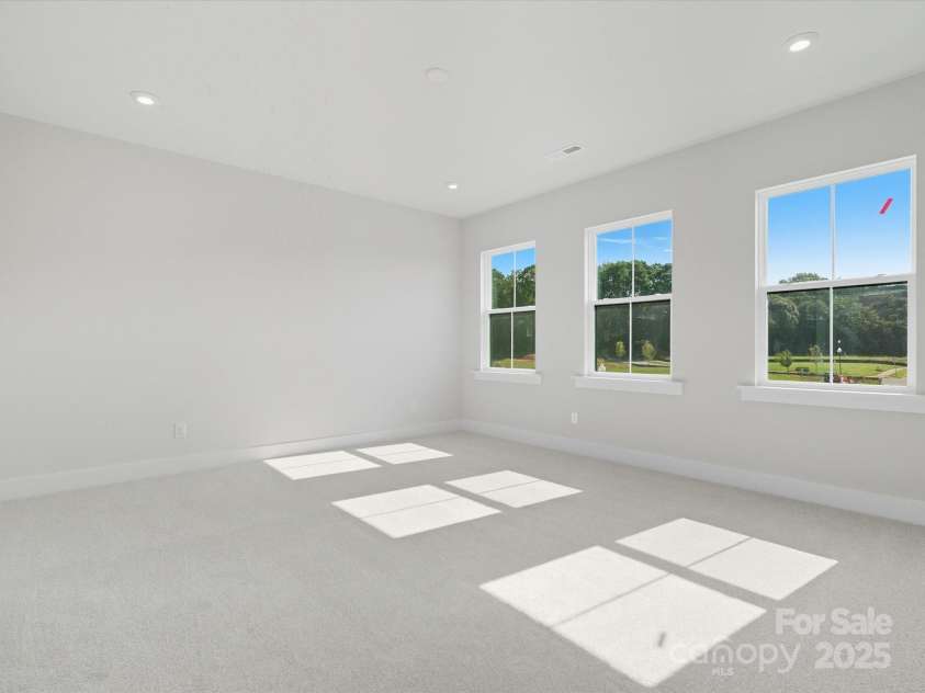 323 Ardmore Drive, Belmont, NC 28012.  MLS# CAR4319122, YatesRealty ID 28845. Primary Suite with Wall of Windows and Unobstructed Views.