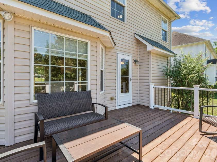 246 Maple Ridge Circle, Salisbury, NC 28147.  MLS# CAR4390588, YatesRealty ID 28849. Deck features vinyl railings and metal balusters