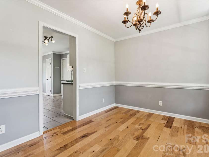 246 Maple Ridge Circle, Salisbury, NC 28147.  MLS# CAR4390588, YatesRealty ID 28849. Dining room looking with kitchen on the left