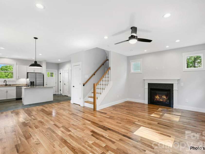 33 Loblolly Lane, Asheville, NC 28803.  MLS# CAR4228799, YatesRealty ID 2885. Gas fireplace in living area for cozy gatherings
